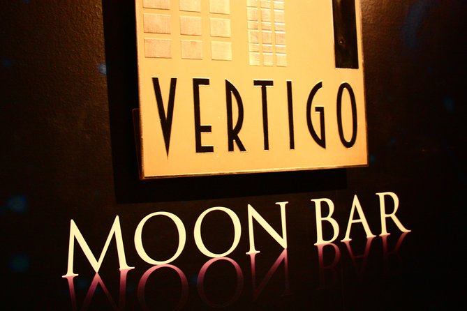 Vertigo Rooftop Dining: A Culinary Journey at Banyan Tree - The complimentary photograph and the busy viewpoint
