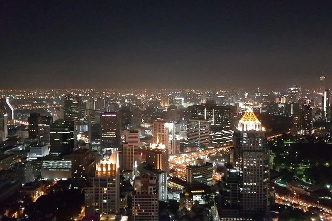 Vertigo TOO Sky Bar: Unlimited Drinks & Spectacular Views - Music and Seating Set the Evening’s Tone