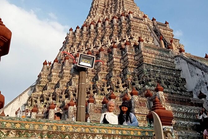 Visit Wat Pho and Wat Arun with Local Expert - Wat Arun beside the Chao Phraya